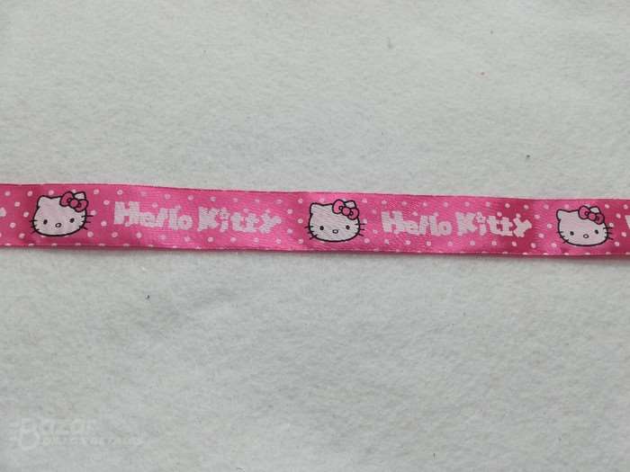 Cinta de falla fondo fucsia estampado de Hello Kitty 2,5ctm de ancho